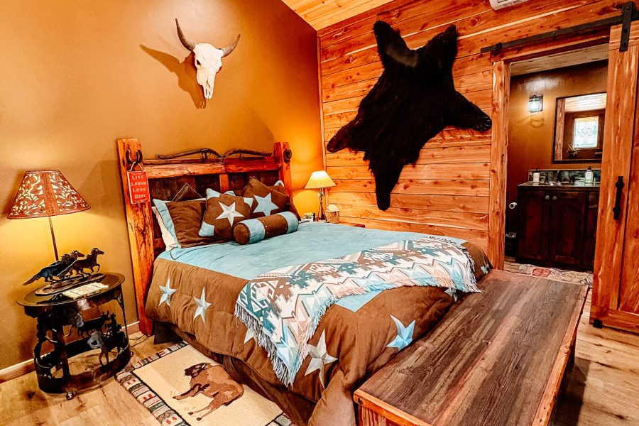 Wood cabin room with cozy bed
